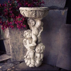 Climbing Cherub Birdbath Stone
